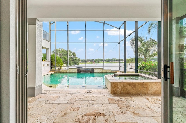 1111 Myrtle Breezes Ct, Fruitland Park, FL 34731 - view of swimming pool with a pool with connected hot tub, a water view, a lanai, and a patio area