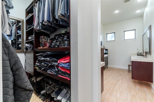 1111 Myrtle Breezes Ct, Fruitland Park, FL 34731 - walk in closet featuring a sink