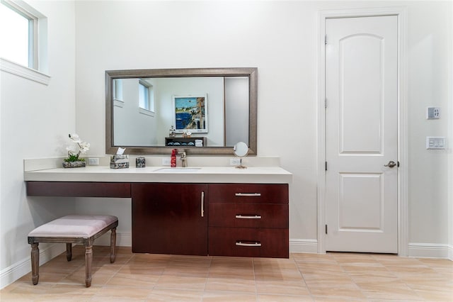 1111 Myrtle Breezes Ct, Fruitland Park, FL 34731 - bathroom with vanity, baseboards, and tile patterned flooring