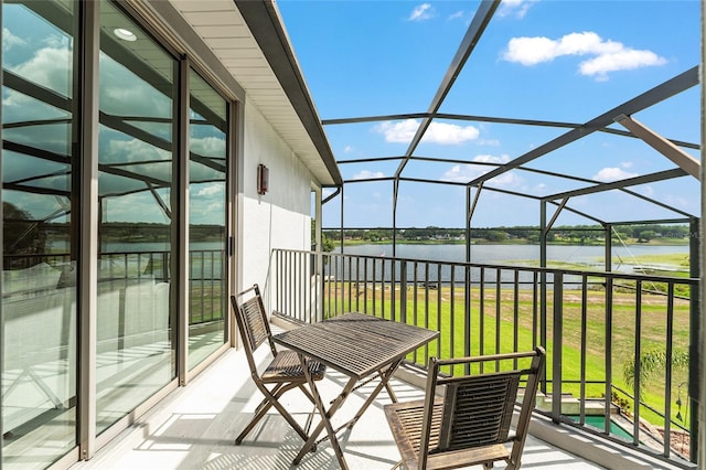 1111 Myrtle Breezes Ct, Fruitland Park, FL 34731 - sunroom with a water view