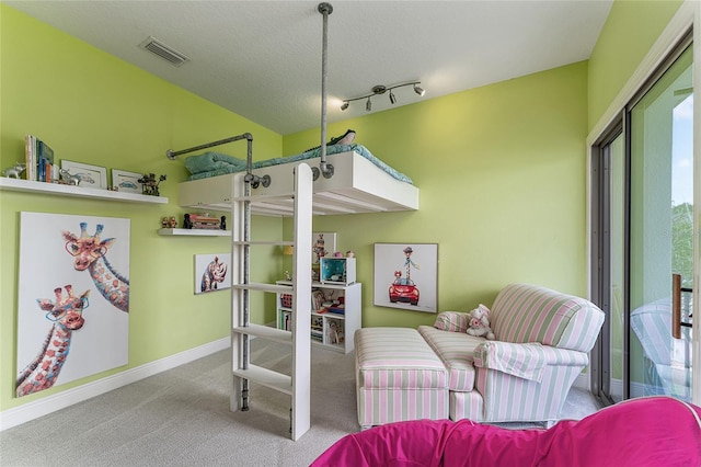 1111 Myrtle Breezes Ct, Fruitland Park, FL 34731 - bedroom with carpet floors, baseboards, and a textured ceiling