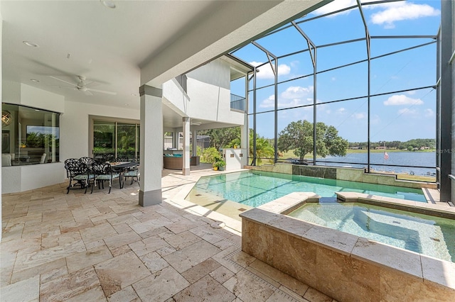 1111 Myrtle Breezes Ct, Fruitland Park, FL 34731 - view of swimming pool featuring a patio, a water view, ceiling fan, a lanai, and a pool with connected hot tub