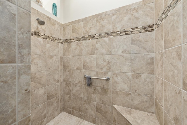details featuring tiled shower