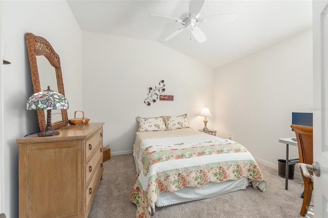 bedroom featuring baseboards, vaulted ceiling, and light colored carpet