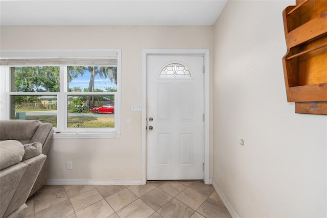 entrance foyer featuring baseboards