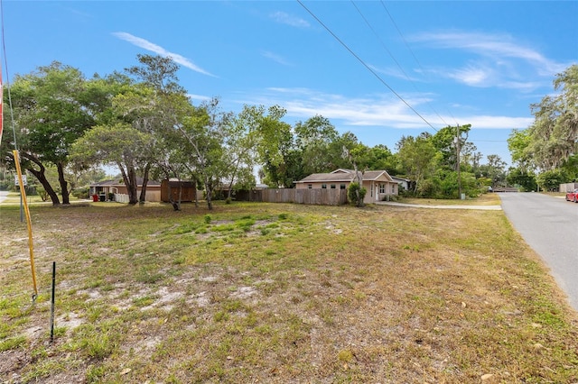 view of yard featuring fence