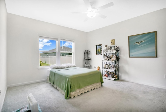 7796 SW 74th Loop, Ocala, FL 34481 - bedroom featuring baseboards, a ceiling fan, and carpet flooring