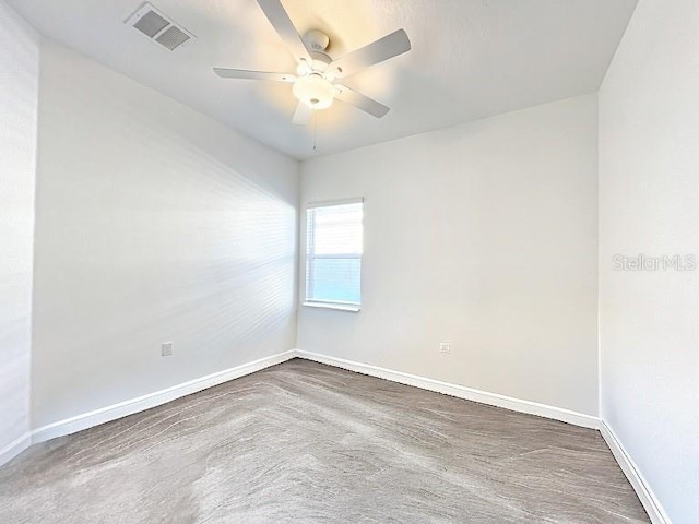 7796 SW 74th Loop, Ocala, FL 34481 - unfurnished room with visible vents, a ceiling fan, and baseboards