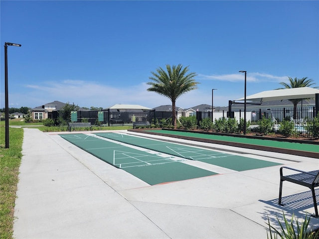 7796 SW 74th Loop, Ocala, FL 34481 - view of community featuring shuffleboard, fence, and a residential view