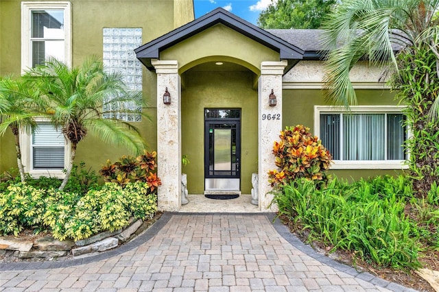 9642 Bear Lake Rd, Apopka, FL 32703 - view of exterior entry with stucco siding