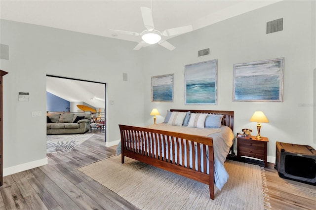 9642 Bear Lake Rd, Apopka, FL 32703 - bedroom with baseboards, wood finished floors, and visible vents