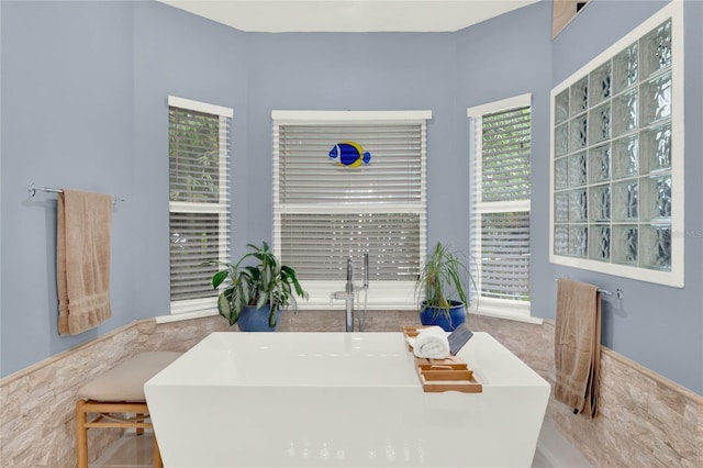 9642 Bear Lake Rd, Apopka, FL 32703 - dining area with wainscoting and tile walls