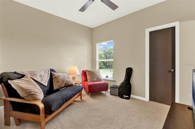 9642 Bear Lake Rd, Apopka, FL 32703 - living area featuring baseboards, a ceiling fan, and carpet flooring