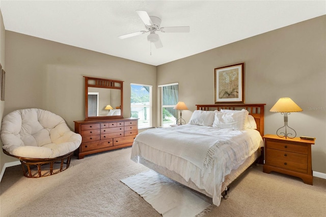 9642 Bear Lake Rd, Apopka, FL 32703 - bedroom with a ceiling fan, baseboards, and light carpet