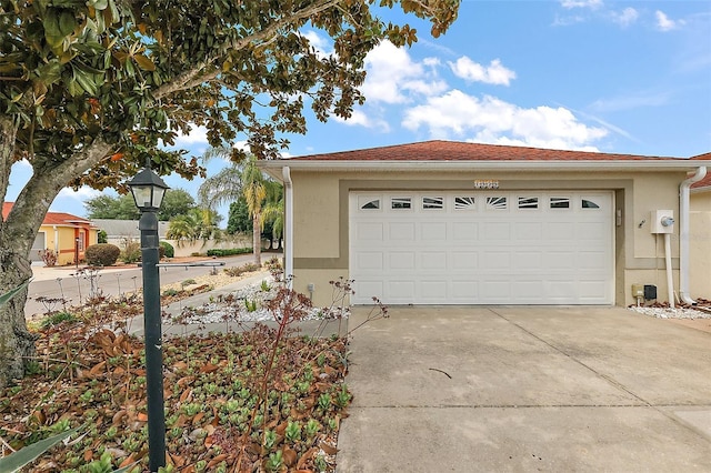 1323 Balboa Ct, The Villages, FL 32159 - garage featuring concrete driveway