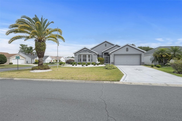 ranch-style home featuring a front lawn, driveway, an attached garage, and stucco siding