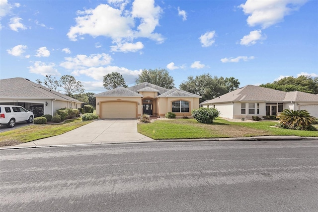 ranch-style house with a garage, a front lawn, stucco siding, and driveway