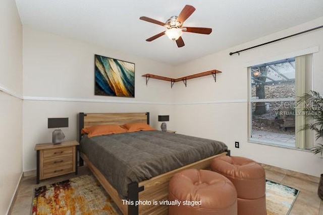 1307 Rain Forest Ln, Minneola, FL 34715 - bedroom with a ceiling fan and baseboards