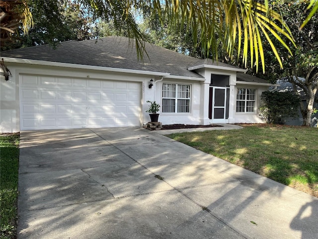 1307 Rain Forest Ln, Minneola, FL 34715 - ranch-style house featuring stucco siding, roof with shingles, driveway, an attached garage, and a front lawn