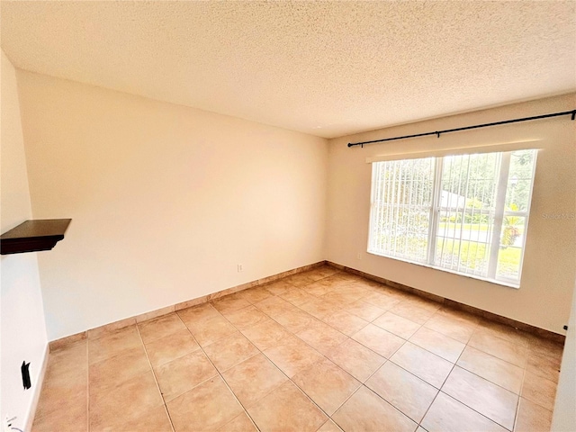 1307 Rain Forest Ln, Minneola, FL 34715 - unfurnished room with a textured ceiling and light tile patterned floors
