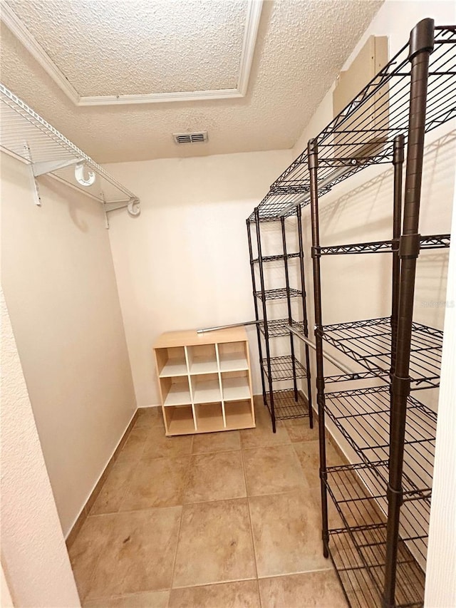 1307 Rain Forest Ln, Minneola, FL 34715 - spacious closet featuring light tile patterned floors