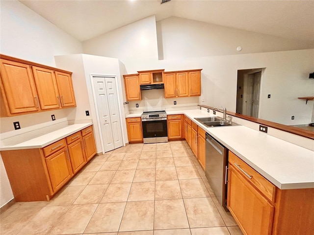 1307 Rain Forest Ln, Minneola, FL 34715 - kitchen with appliances with stainless steel finishes, a peninsula, high vaulted ceiling, light countertops, and light tile patterned flooring