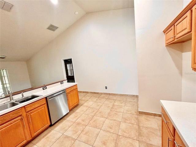1307 Rain Forest Ln, Minneola, FL 34715 - kitchen featuring stainless steel dishwasher, light countertops, high vaulted ceiling, light tile patterned floors, and brown cabinetry