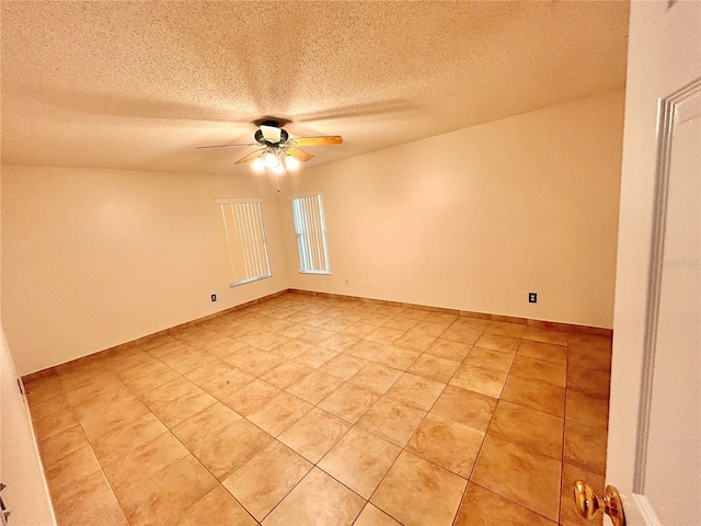 1307 Rain Forest Ln, Minneola, FL 34715 - empty room with ceiling fan, a textured ceiling, and light tile patterned flooring