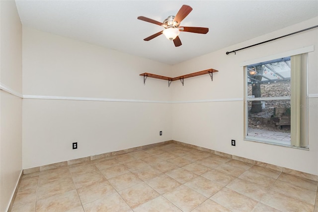 1307 Rain Forest Ln, Minneola, FL 34715 - empty room featuring ceiling fan and baseboards