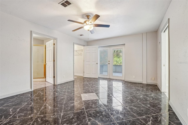 unfurnished bedroom featuring access to outside, french doors, marble finish floor, and visible vents