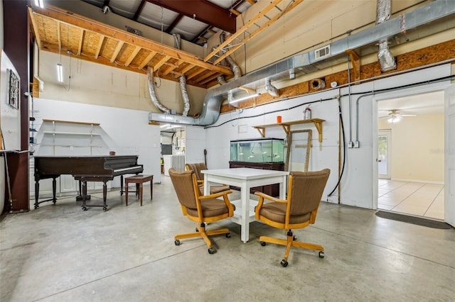 interior space with visible vents, finished concrete flooring, and ceiling fan