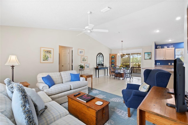 8097 SE 174th Belhaven Loop, The Villages, FL 32162 - living room featuring lofted ceiling, ceiling fan, and a chandelier