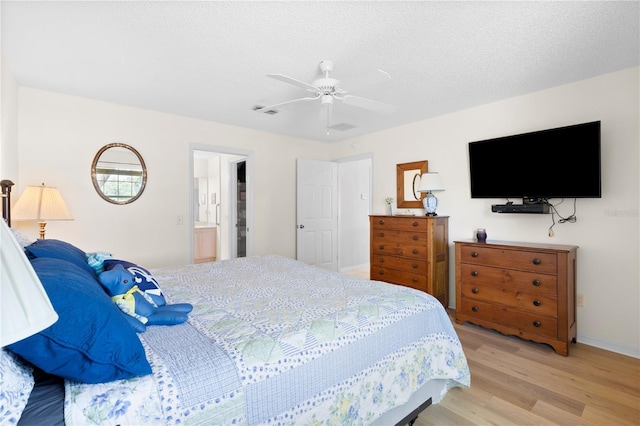 8097 SE 174th Belhaven Loop, The Villages, FL 32162 - bedroom with light wood-type flooring, baseboards, and ceiling fan