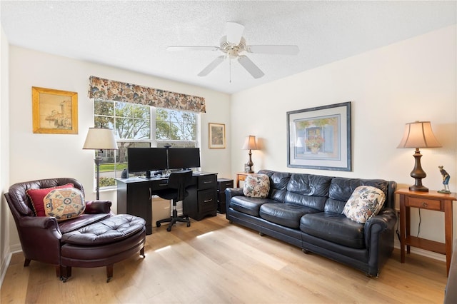 8097 SE 174th Belhaven Loop, The Villages, FL 32162 - office featuring light wood-type flooring, a ceiling fan, and a textured ceiling