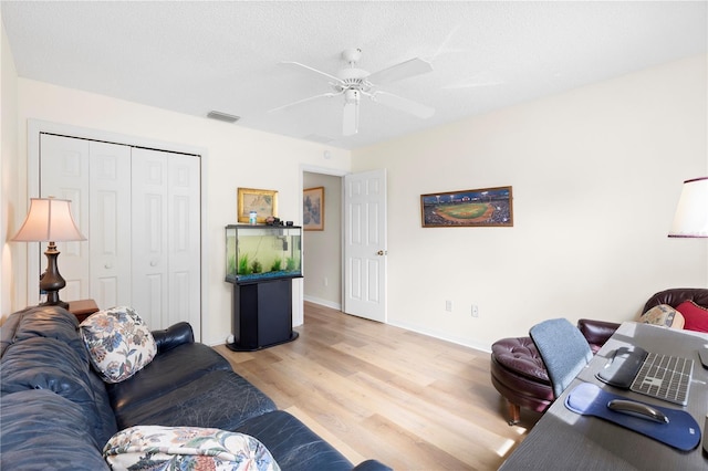 8097 SE 174th Belhaven Loop, The Villages, FL 32162 - office featuring light wood-style flooring, a ceiling fan, and baseboards