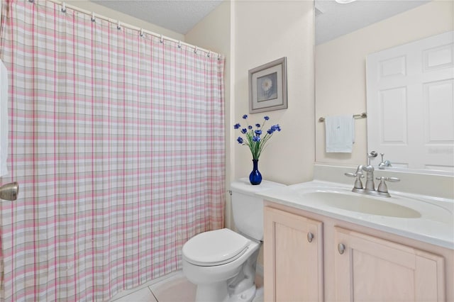 8097 SE 174th Belhaven Loop, The Villages, FL 32162 - bathroom with toilet, vanity, a textured ceiling, a shower with shower curtain, and tile patterned floors