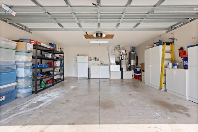 8097 SE 174th Belhaven Loop, The Villages, FL 32162 - garage with freestanding refrigerator, water heater, washing machine and dryer, and heating unit