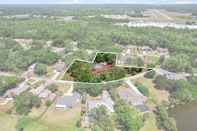 497 N Afterglow Cir, Crystal River, FL 34429 - bird's eye view featuring a view of trees and a residential view