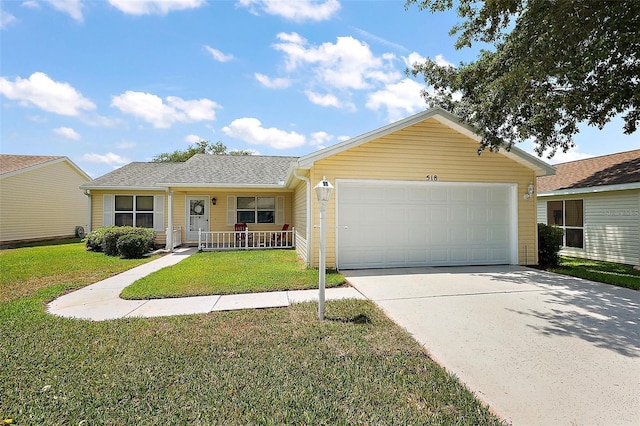 518 Alcazar Ct, The Villages, FL 32159 - single story home with driveway, a front yard, a porch, and an attached garage