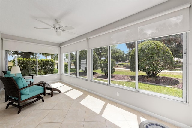 sunroom / solarium with ceiling fan and plenty of natural light