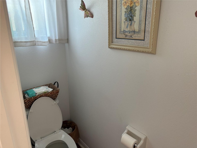 bathroom featuring toilet