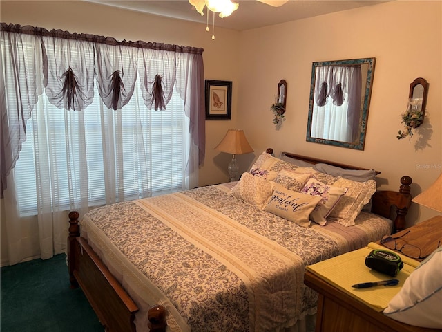 bedroom with dark carpet