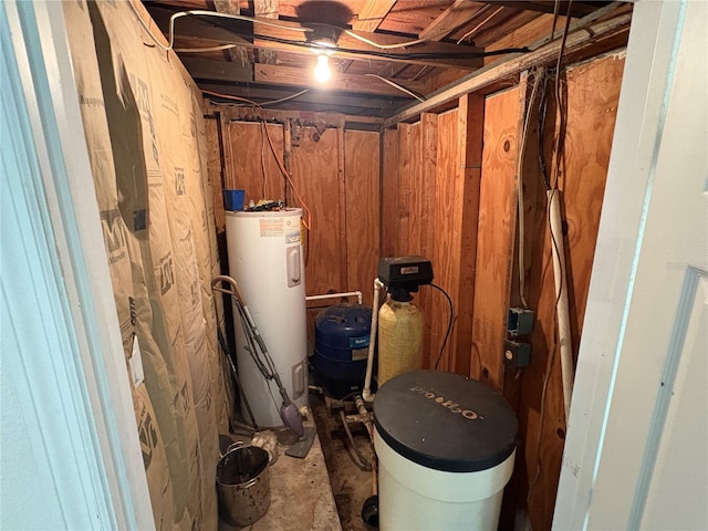 utility room featuring water heater