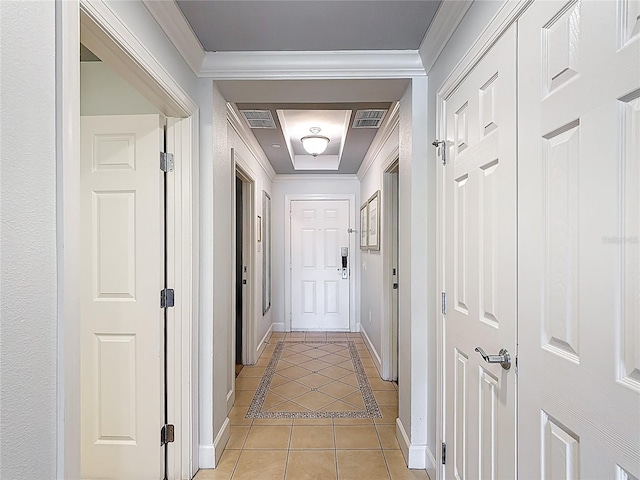 1356 Centre Court Ridge Dr Unit 103, Reunion, FL 34747 - corridor with visible vents, baseboards, ornamental molding, and light tile patterned floors