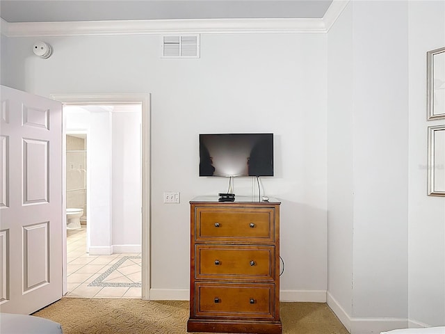 1356 Centre Court Ridge Dr Unit 103, Reunion, FL 34747 - bedroom featuring visible vents, baseboards, ornamental molding, and light tile patterned floors