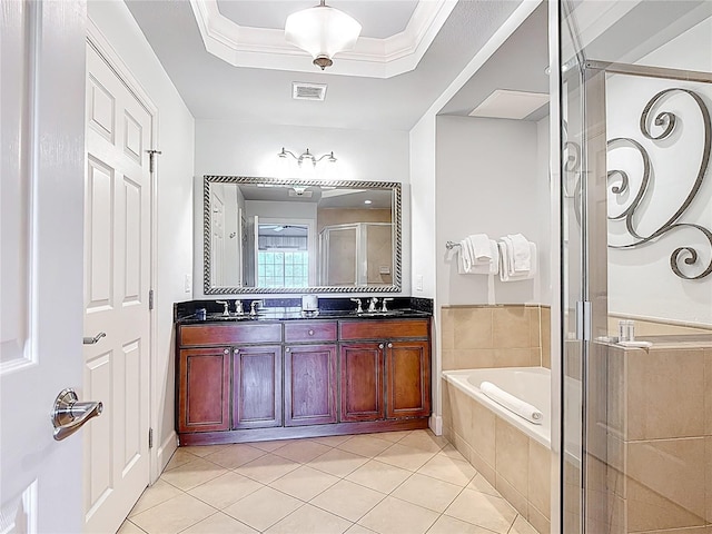 1356 Centre Court Ridge Dr Unit 103, Reunion, FL 34747 - full bathroom with tile patterned floors, double vanity, visible vents, a garden tub, and a stall shower