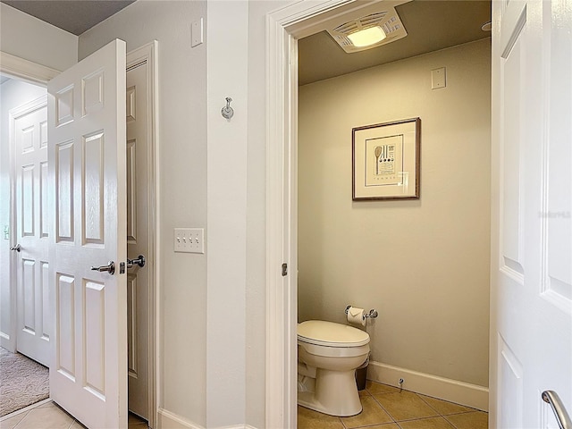 1356 Centre Court Ridge Dr Unit 103, Reunion, FL 34747 - bathroom featuring visible vents, tile patterned flooring, baseboards, and toilet