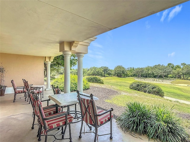 1356 Centre Court Ridge Dr Unit 103, Reunion, FL 34747 - view of patio / terrace featuring view of golf course