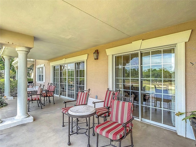 1356 Centre Court Ridge Dr Unit 103, Reunion, FL 34747 - view of patio with covered porch