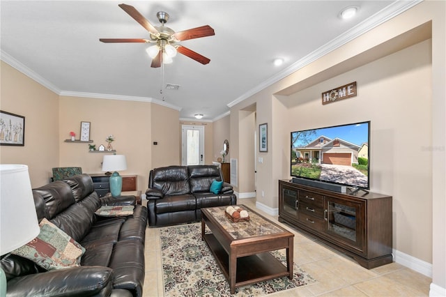 living room featuring crown molding, light tile patterned flooring, ceiling fan, baseboards, and visible vents
